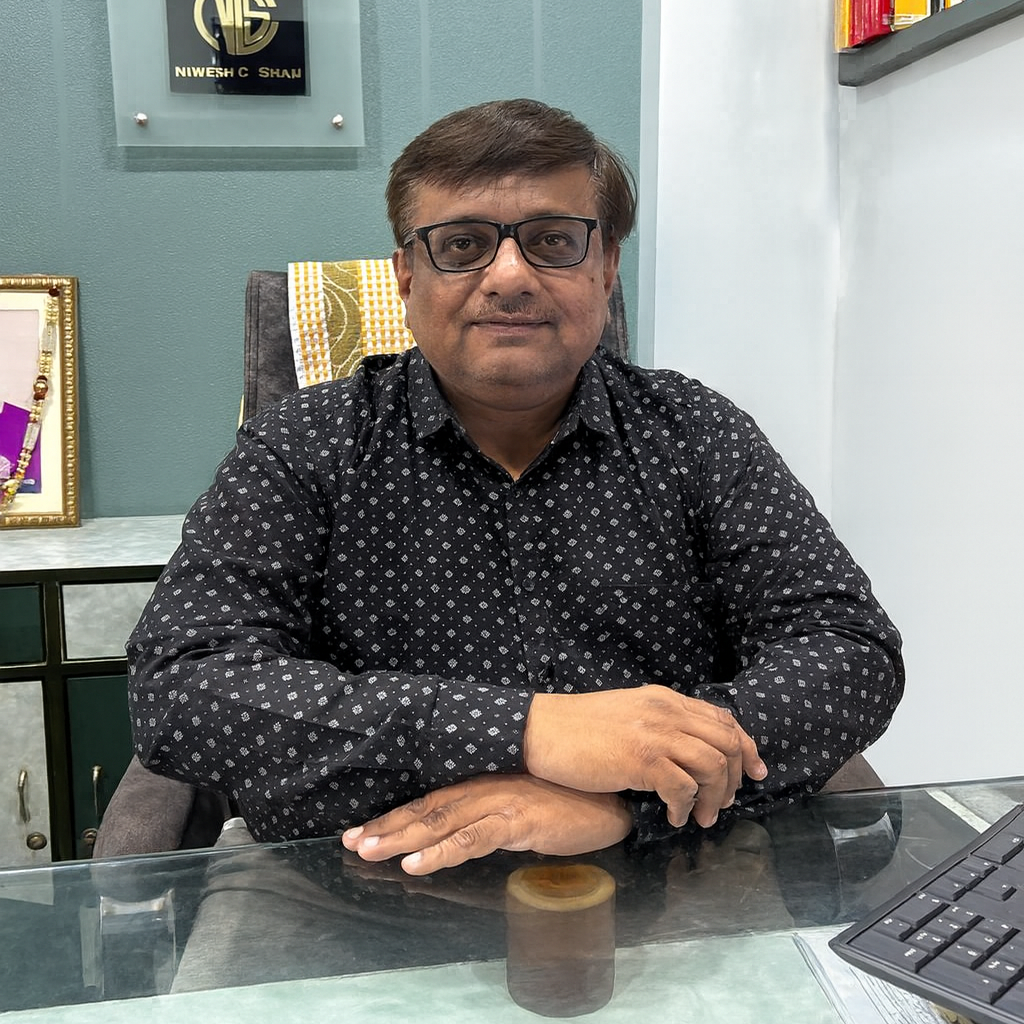 Nilesh C Shah